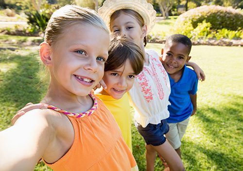Four kids in the garden